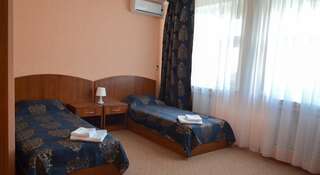 Гостиница Азалия Казань Улучшенный двухместный номер с 2 отдельными кроватями и балконом-3